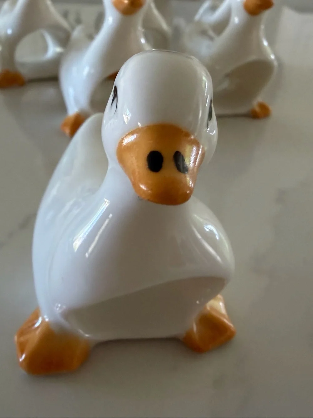 7 ceramic geese/duck napkin holders